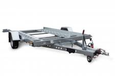 Pierwsza laweta jednoosiowa z kołami na zewnątrz powierzchni transportowej w ofercie TEMARED Pierwsza laweta jednoosiowa z kołami na zewnątrz powierzchni transportowej w ofercie TEMARED