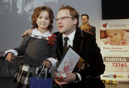 Maciej Stuhr i mała Patrycja